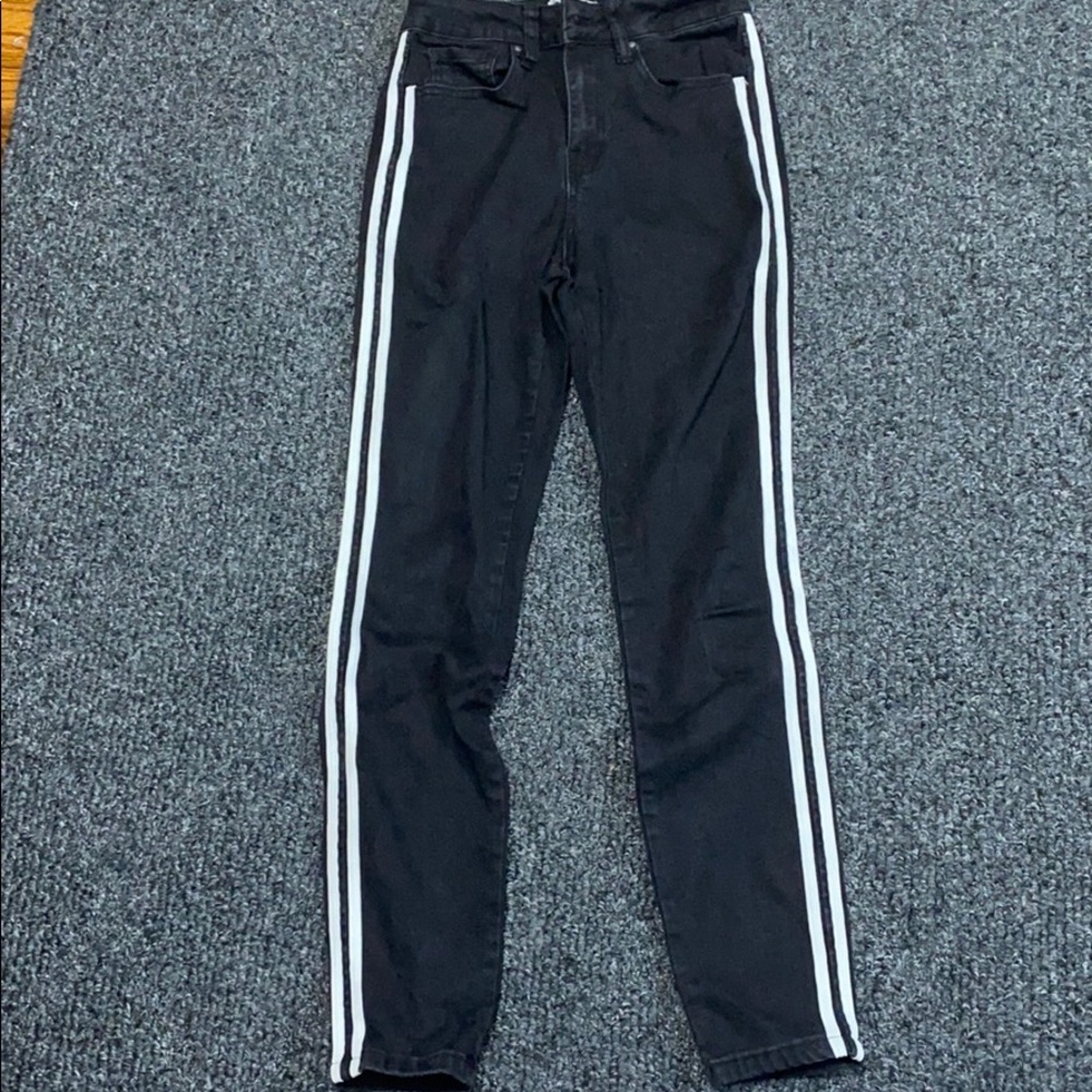 Black skinny jeans with white stripes